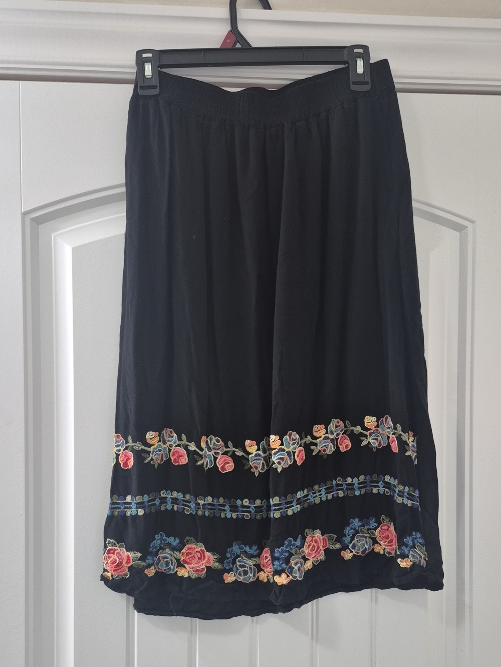 Embroidered Black Skirt with Floral Trim
